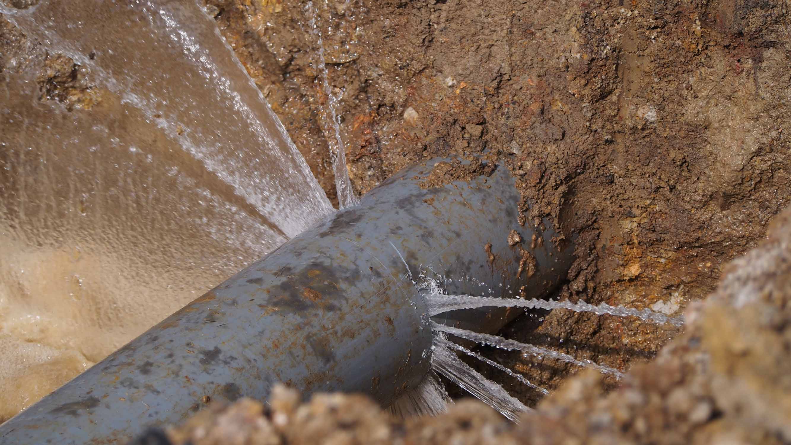 A leaking pipe - contact WyattWorks today to discuss installing moen flow for leak protection.